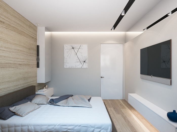 Современная уютная спальня с деревянной отделкой акцентной стены