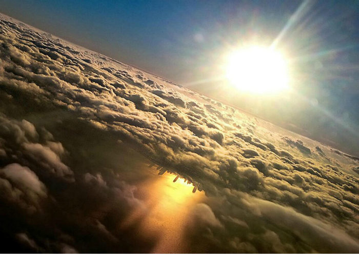 Отражение Чикаго в озере Мичиган. Фотограф: Марк Херш.