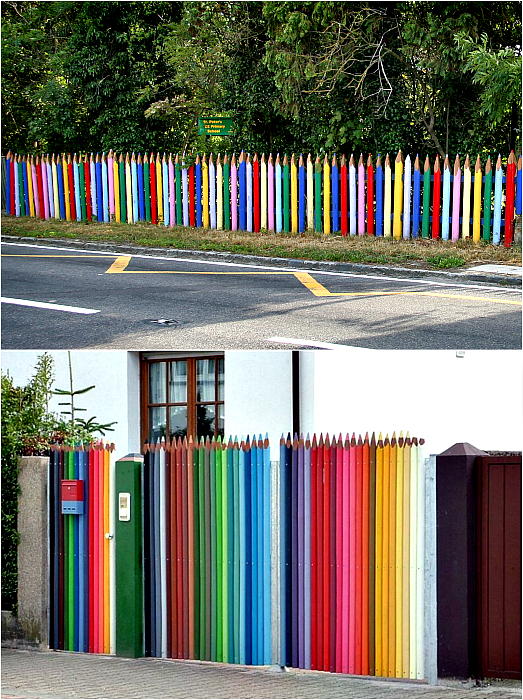 Забор в виде цветных карандашей.
