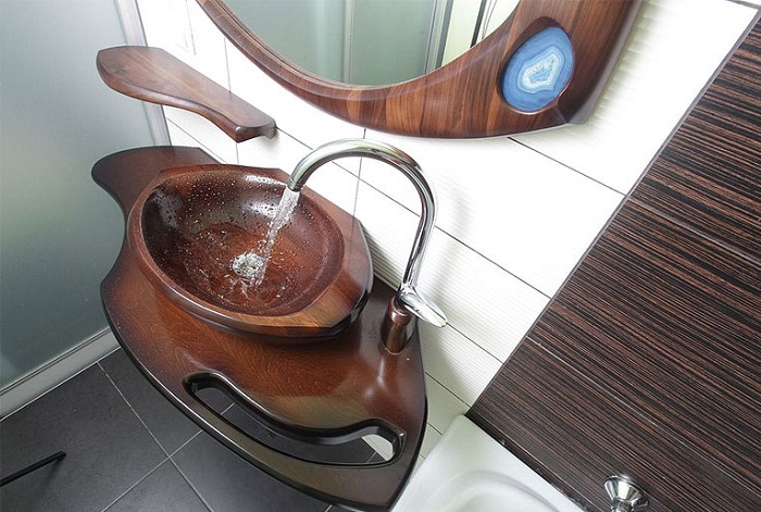 Крутой вариант облагородить интерьер ванной комнаты с помощью такой интересной раковины