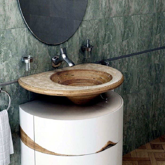 Преобразить пространство в ванной комнате возможно за счет крутой раковины, что вдохновит.