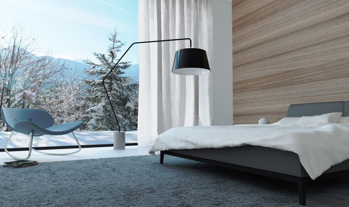 Спальня в минималистском стиле с красивым зимним видом из окна подарит волшебное настроение.