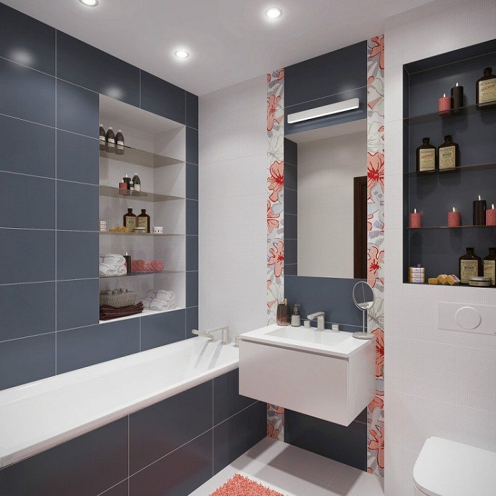 Інтер'єр ванної-кімнати перетворений за рахунок кольорових вставок на кахлі, що виглядають чудово.